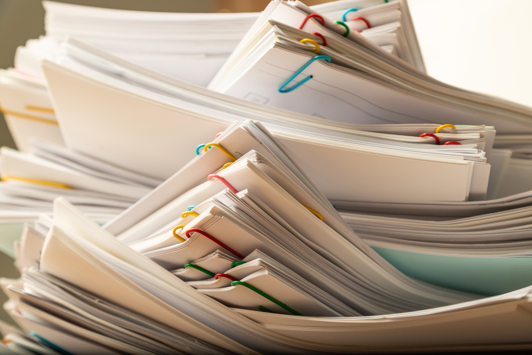 Stacks of papers - call Liberty Paperwork Solutions